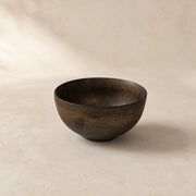 Handcrafted black ceramic bowl with golden highlights – Ø 13.5 cm